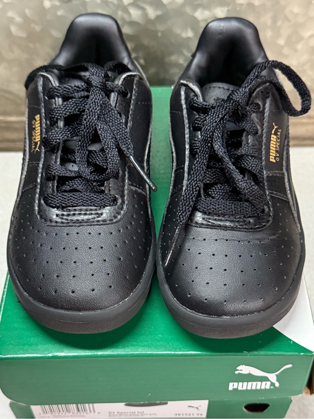 Puma Kids Black Low-Top Lace Sneakers with Gold Logo